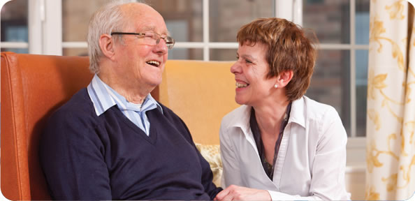 Home Manager smiling at male resident